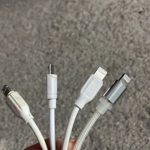 Three iPhone chargers